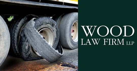 Closeup of tire blowout on 18-wheeler